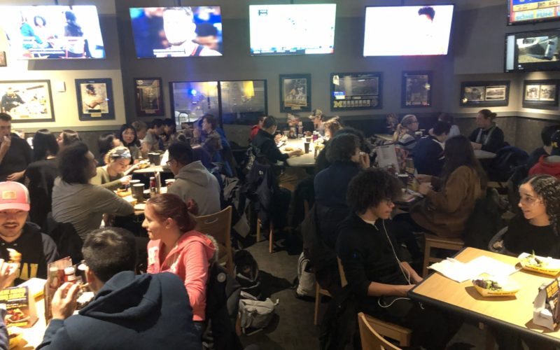 group of people at buffalo wild wings